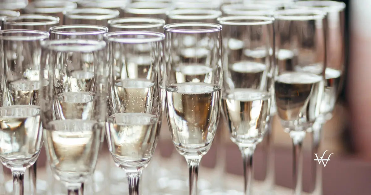 elegant champagne glasses in soft focus setting