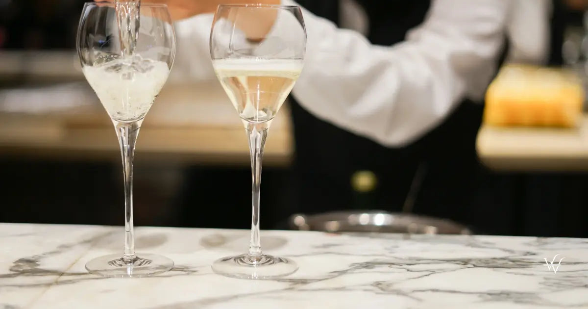pouring sparkling wine into elegant flutes