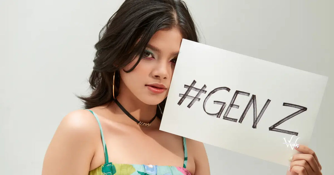 trendy teenager show a text board with the text gen z she has rainbow eyeshadow and croptop tropical pattern