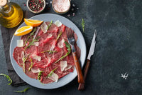 Beef Carpaccio with Arugula, Parmesan and Lemon Slices